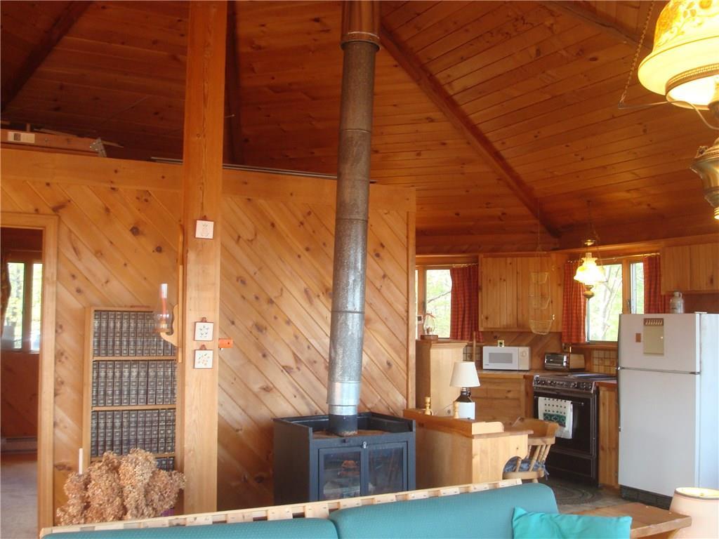 571 West Road Waterboro, ME 04087 - Photo 16 of 34 Kitchen and wood stove