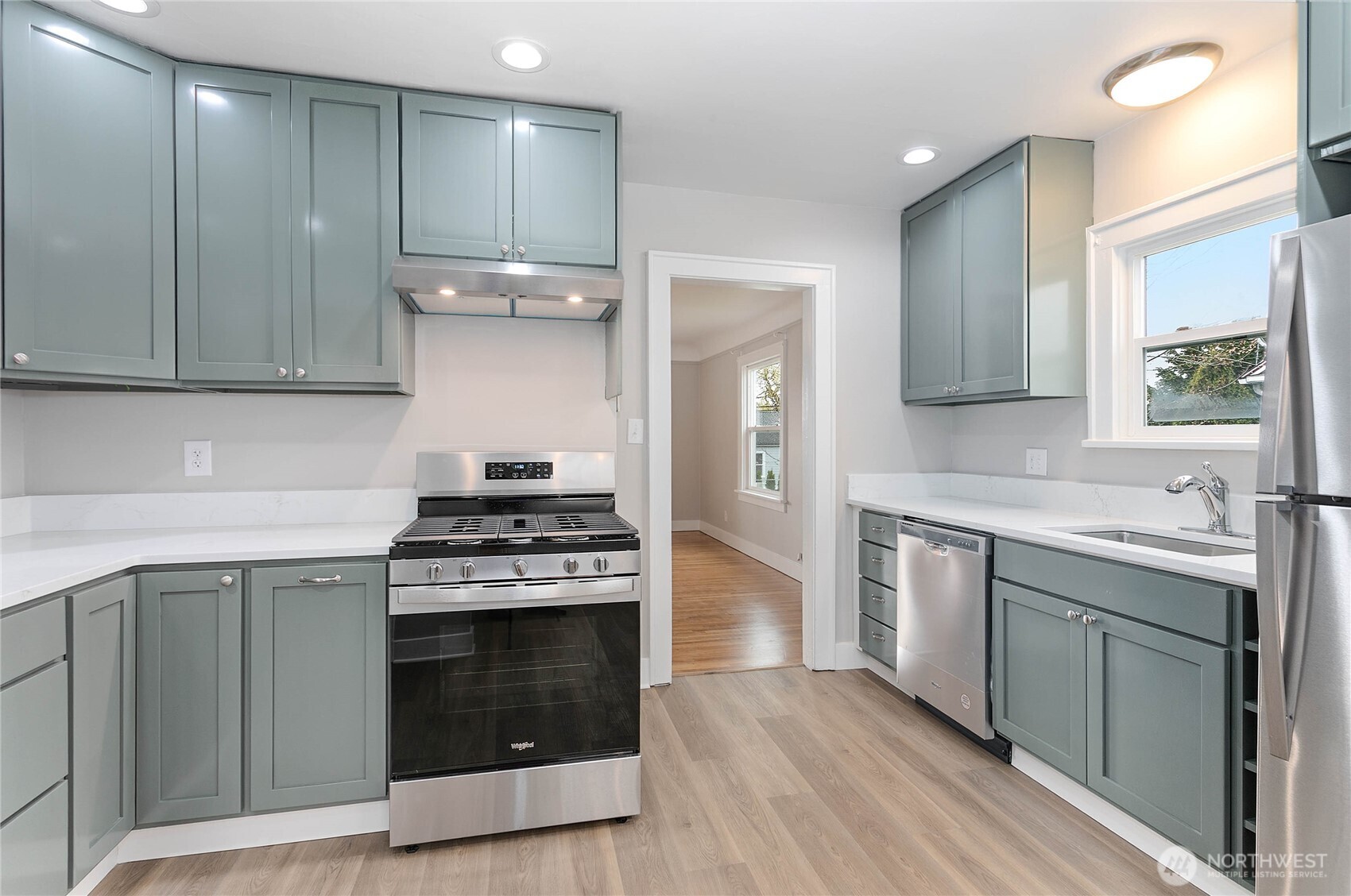 605 Alabama Street Bellingham, WA 98225 - Photo 8 of 27 a kitchen with a stove and a sink