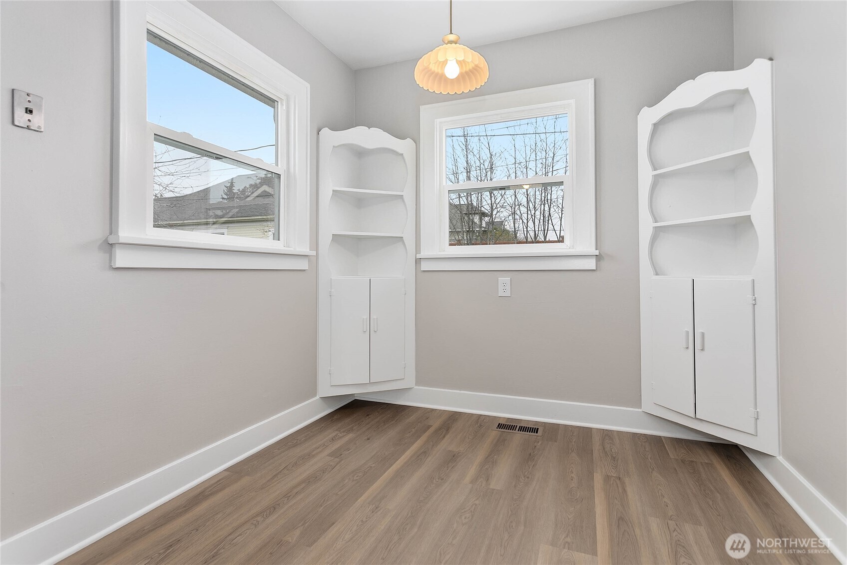 605 Alabama Street Bellingham, WA 98225 - Photo 10 of 27 an empty room with a window and wooden floor