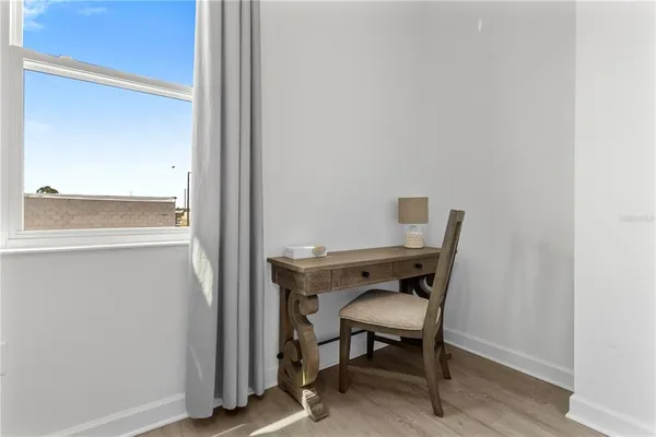 a bedroom with a bed and closet