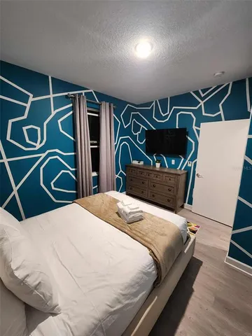 a utility room with sink dryer and washer
