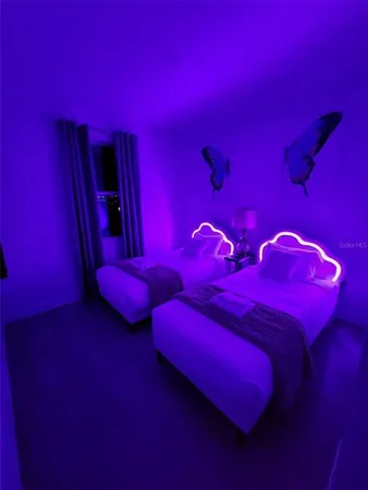 a view of a bathroom with a sink and a window