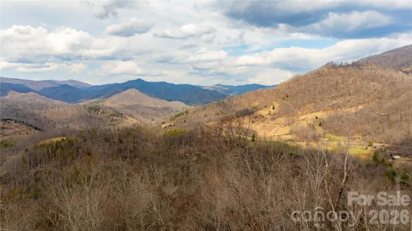 a view of mountain with sky