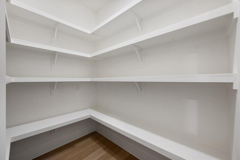 3001 Rock Road Corsicana, TX 75109 - Photo 14 of 40 a storage room with empty racks