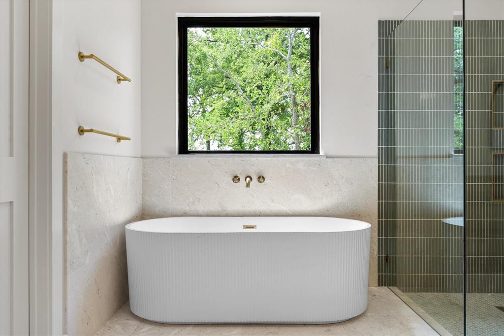 3001 Rock Road Corsicana, TX 75109 - Photo 24 of 40 a white bath tub sitting in a bathroom