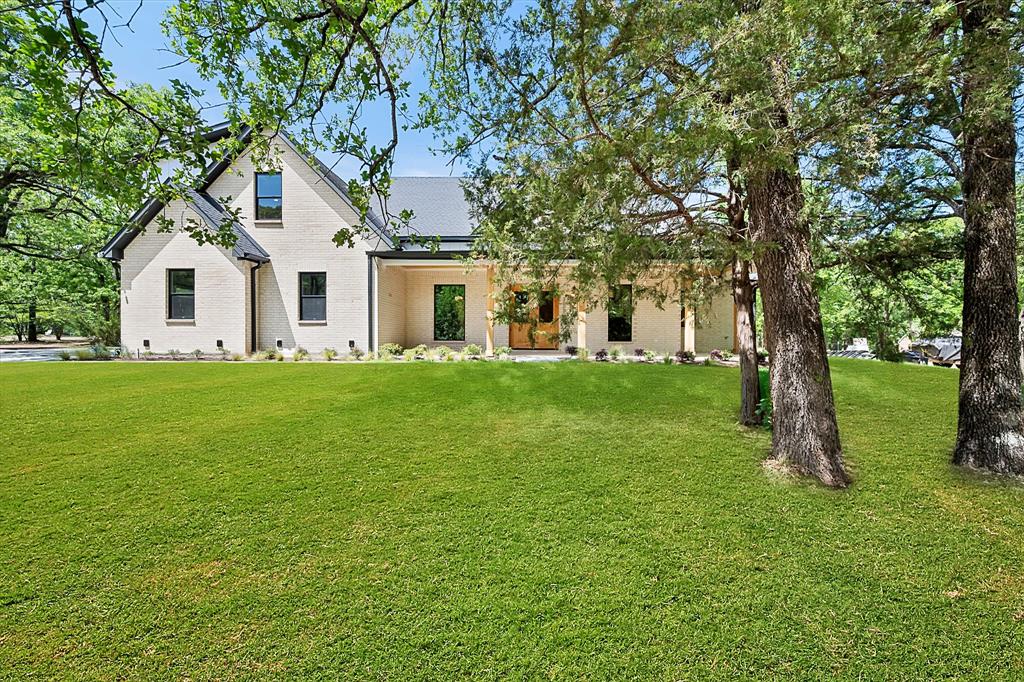 3001 Rock Road Corsicana, TX 75109 - Photo 3 of 40 a front view of house with garden