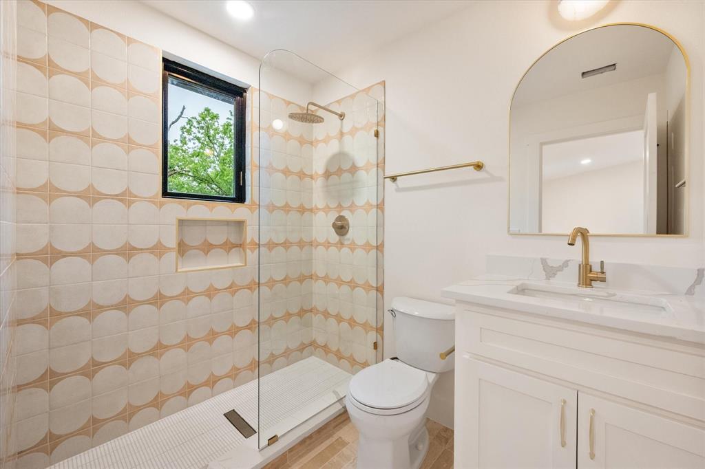 3001 Rock Road Corsicana, TX 75109 - Photo 33 of 40 a bathroom with a sink toilet and shower