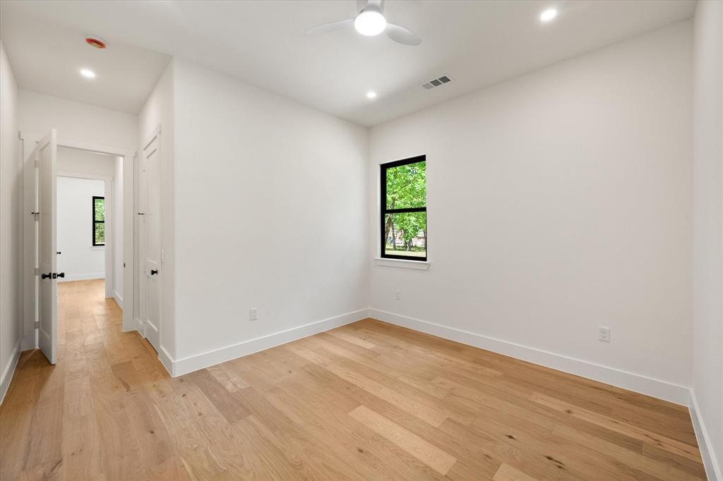 3001 Rock Road Corsicana, TX 75109 - Photo 34 of 40 an empty room with a window and wooden floor