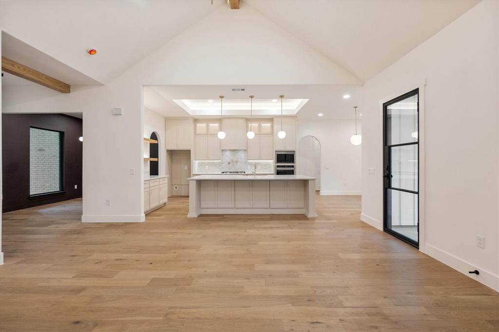3001 Rock Road Corsicana, TX 75109 - Photo 7 of 40 a view of a kitchen with granite countertop a refrigerator and a sink