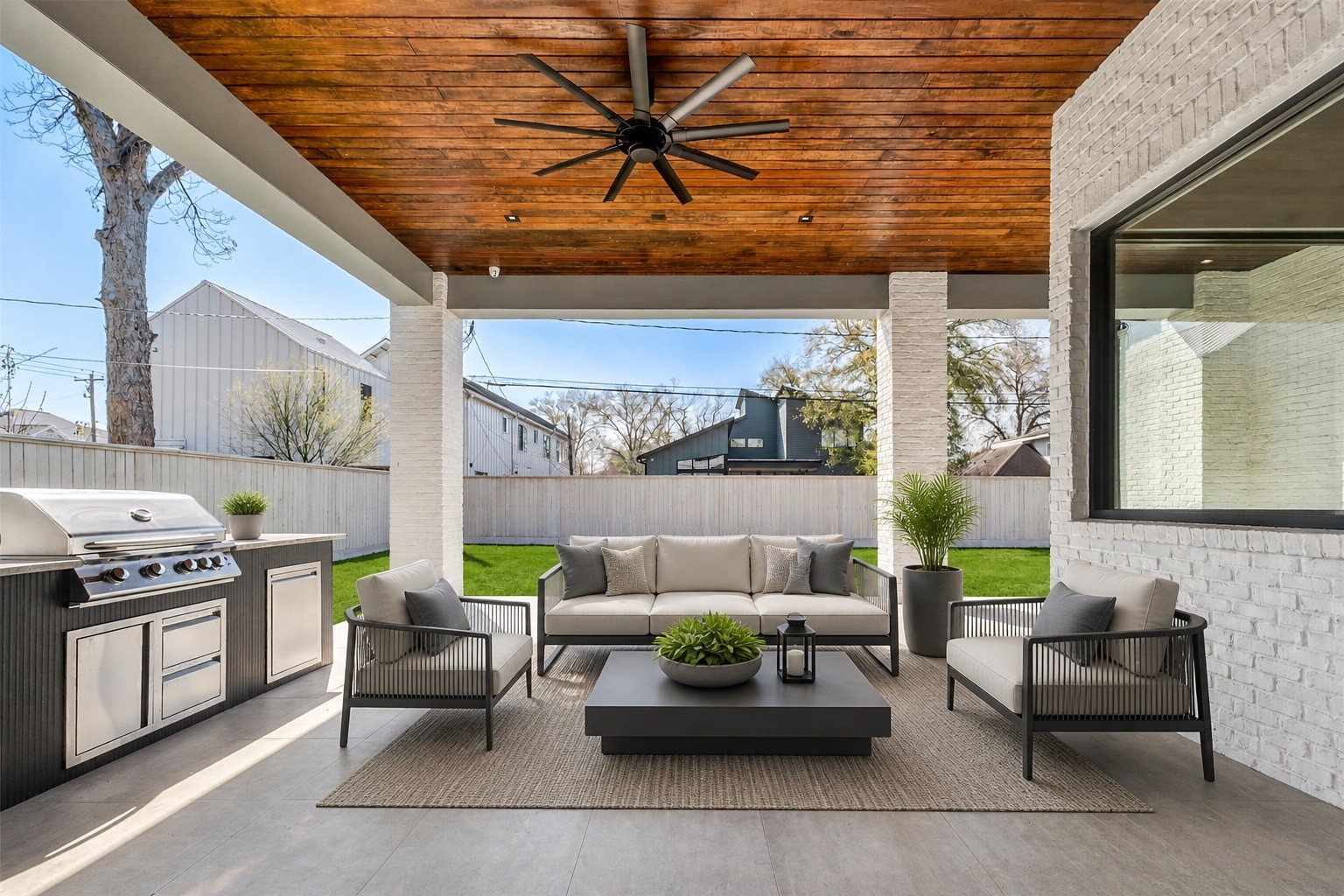 207 West 33rd Street Houston, TX 77018 - Photo 10 of 50 Covered outdoor patio complete with a built-in kitchen and 48” stainless steel grill, perfect for year-round entertaining. (Picture is an AI rendering)