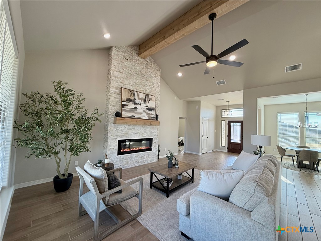 203 Lasso Loop Lorena, TX 76655 - Photo 14 of 37 a living room with furniture and a fireplace