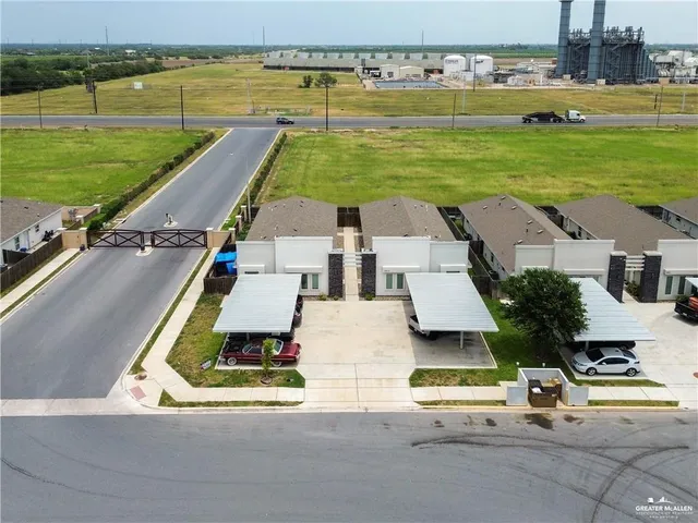 swimming pool view with a lake view