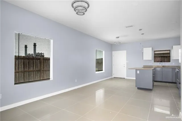 a view of livingroom with furniture and window