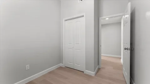 an empty room with closet