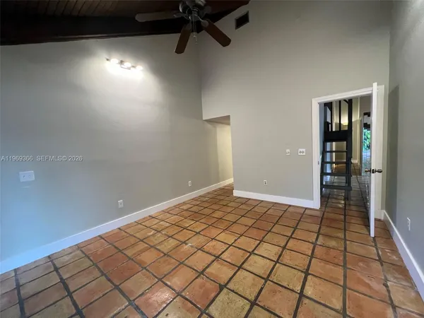 a view of an empty room and window