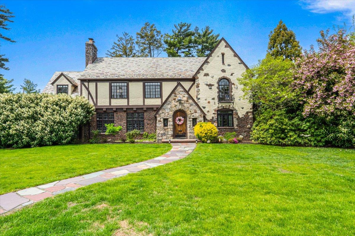 76 Eton Road Garden City, NY 11530 - Photo 1 of 1 a view of a house with garden and yard