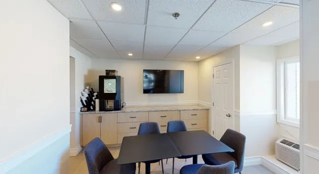 a view of a dining room with furniture