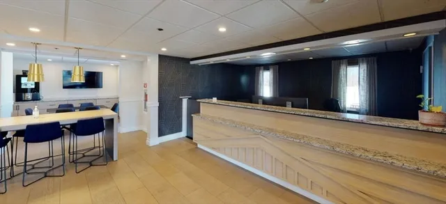 a bathroom with a sink and a large mirror