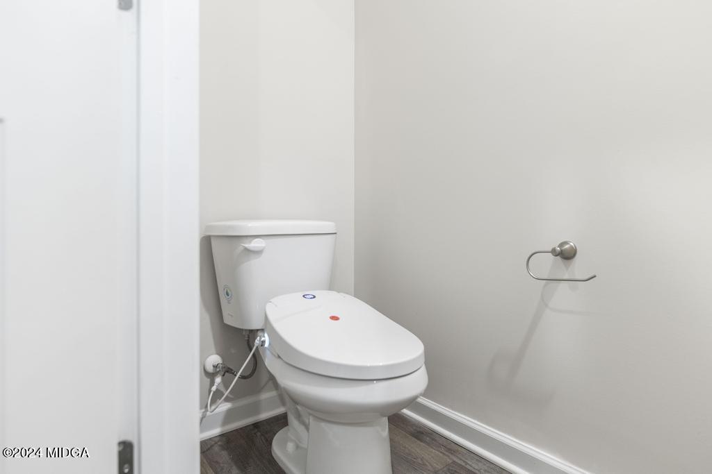 108 Cornfield Circle Perry, GA 31069 - Photo 18 of 39 a white toilet sitting next to a shower