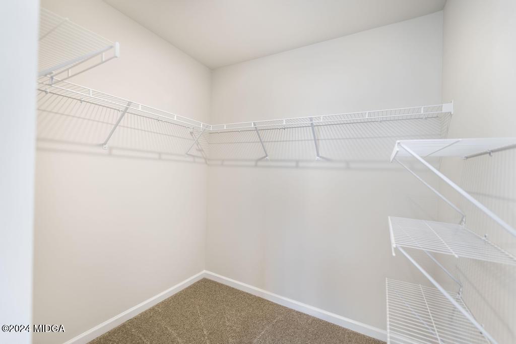 108 Cornfield Circle Perry, GA 31069 - Photo 26 of 39 a view of a room with racks on the wall