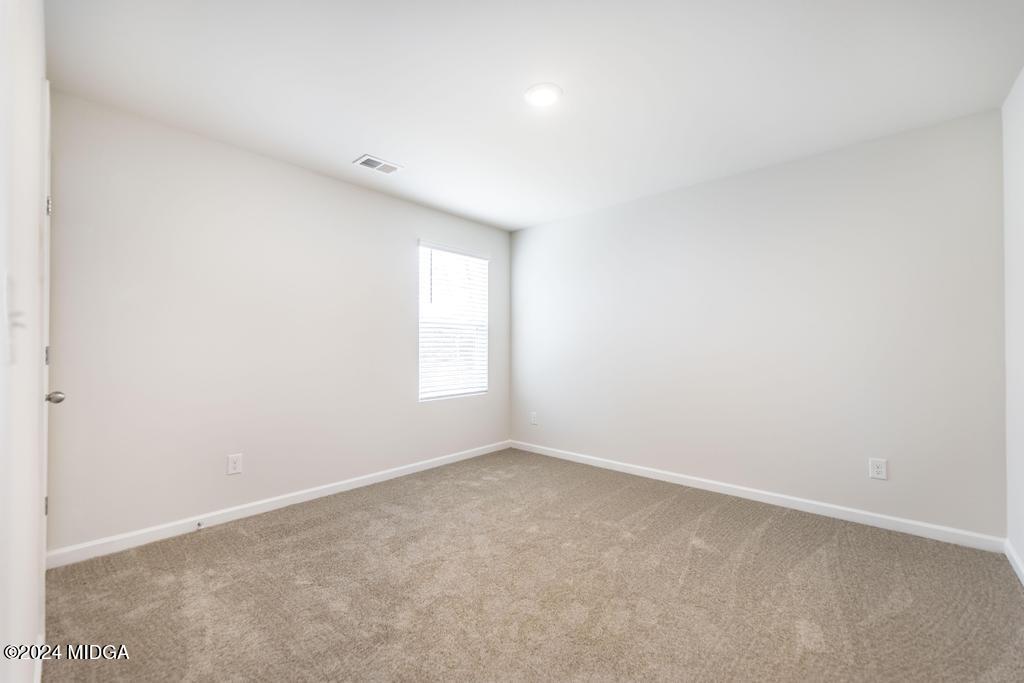108 Cornfield Circle Perry, GA 31069 - Photo 27 of 39 an empty room with a window