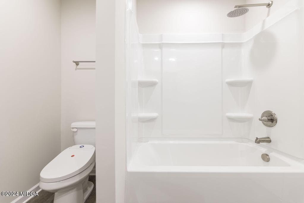 108 Cornfield Circle Perry, GA 31069 - Photo 32 of 39 a bathroom with a bathtub and a toilet