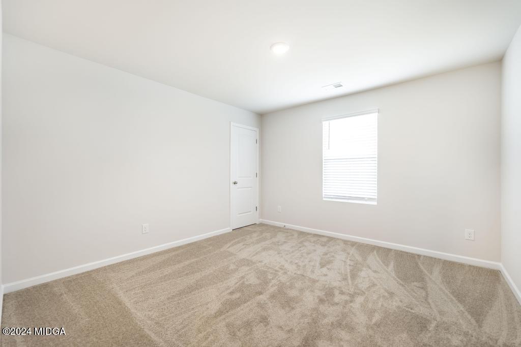 108 Cornfield Circle Perry, GA 31069 - Photo 33 of 39 an empty room with a window