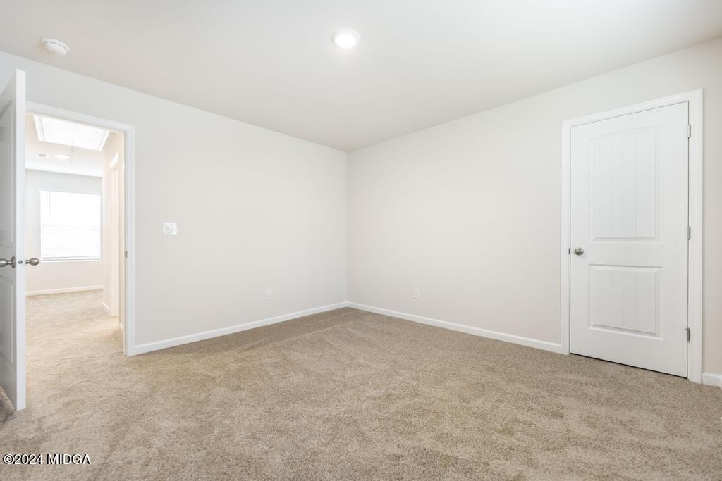 108 Cornfield Circle Perry, GA 31069 - Photo 34 of 39 an empty room with an entryway