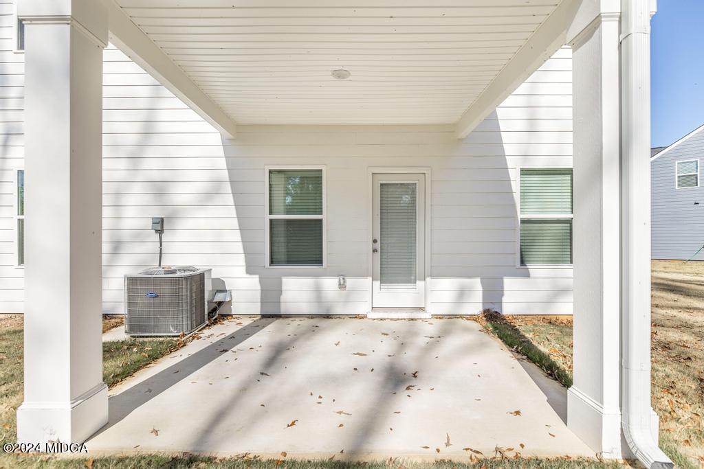 108 Cornfield Circle Perry, GA 31069 - Photo 36 of 39 a view of a living room and a large window