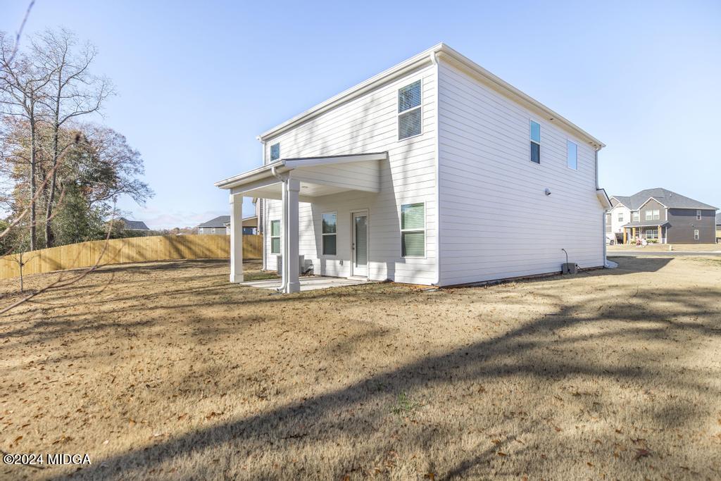 108 Cornfield Circle Perry, GA 31069 - Photo 37 of 39 a view of a house with a yard