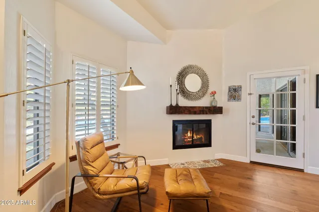 a bed room with a bed and a fireplace