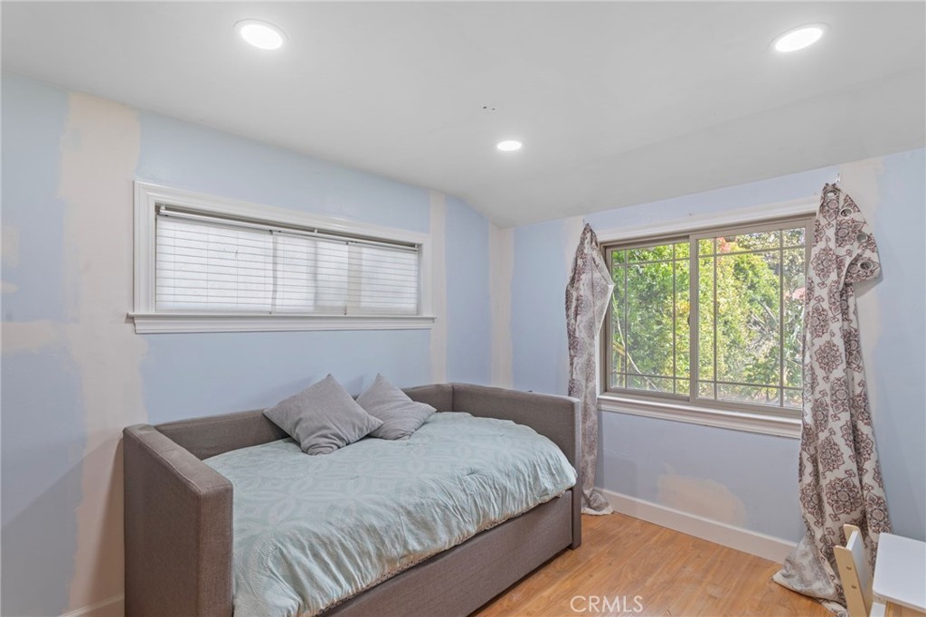 4065 Tenango Road Claremont, CA 91711 - Photo 19 of 30 a bedroom with a bed and a window