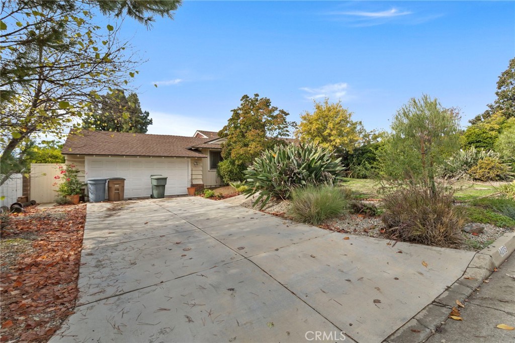 4065 Tenango Road Claremont, CA 91711 - Photo 25 of 30 a view of a house with a tree and a yard