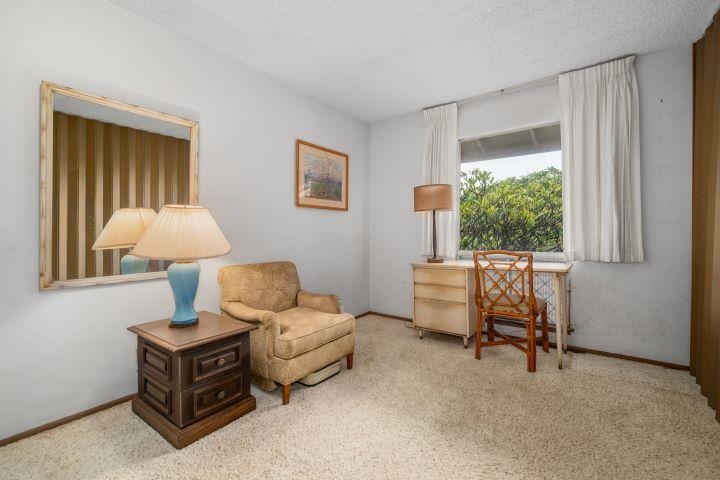 150 Puukolii Road, Unit 17 Lahaina, HI 96761 - Photo 23 of 40 a living room with furniture and a window