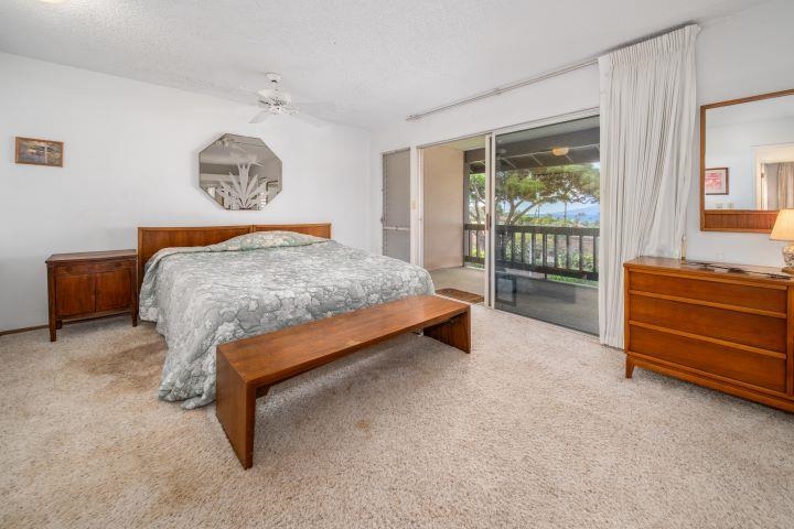 150 Puukolii Road, Unit 17 Lahaina, HI 96761 - Photo 36 of 40 a bedroom with a bed and a window