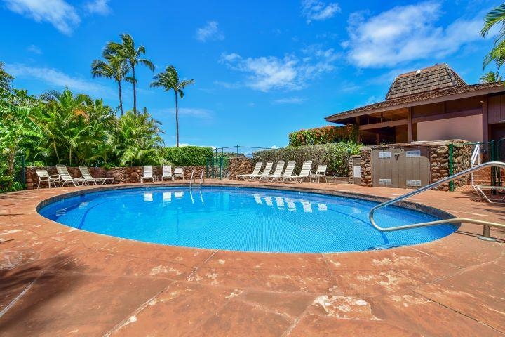 150 Puukolii Road, Unit 17 Lahaina, HI 96761 - Photo 4 of 40 a view of a swimming pool with an outdoor seating