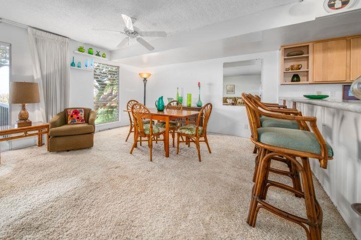 150 Puukolii Road, Unit 17 Lahaina, HI 96761 - Photo 8 of 40 a dining room with furniture and window