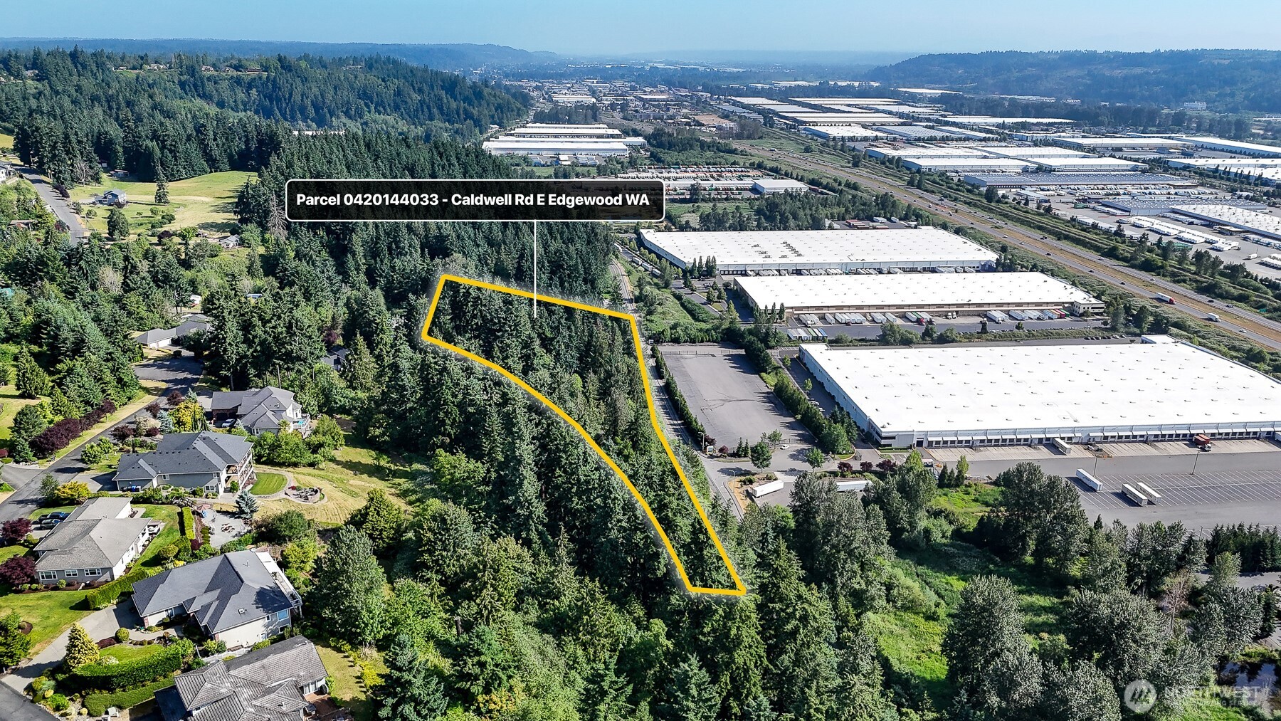 0 Caldwell Road East Puyallup, WA 98372 - Photo 11 of 13 a view of a city from a lake