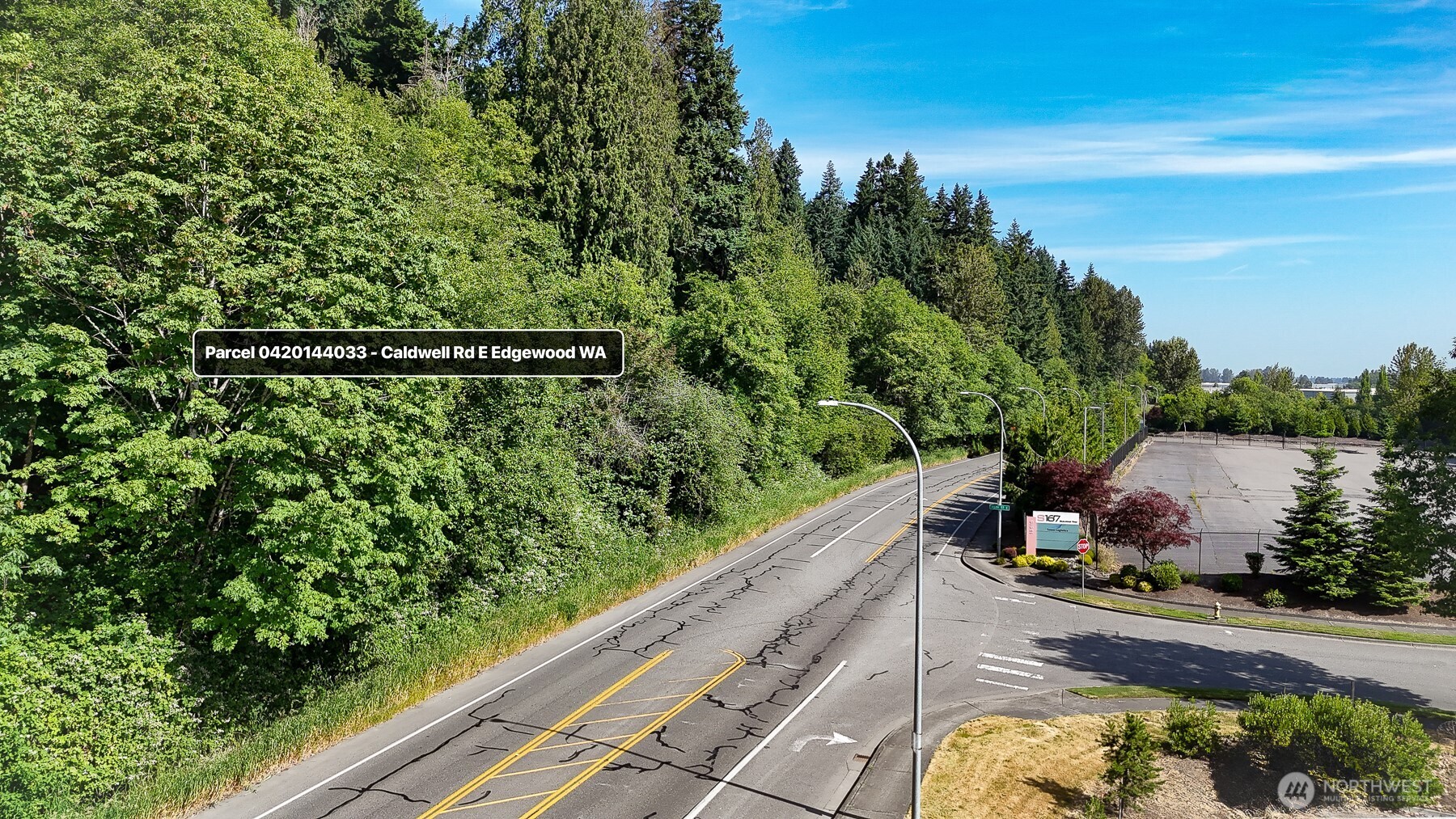 0 Caldwell Road East Puyallup, WA 98372 - Photo 3 of 13 a view of a garden from a balcony