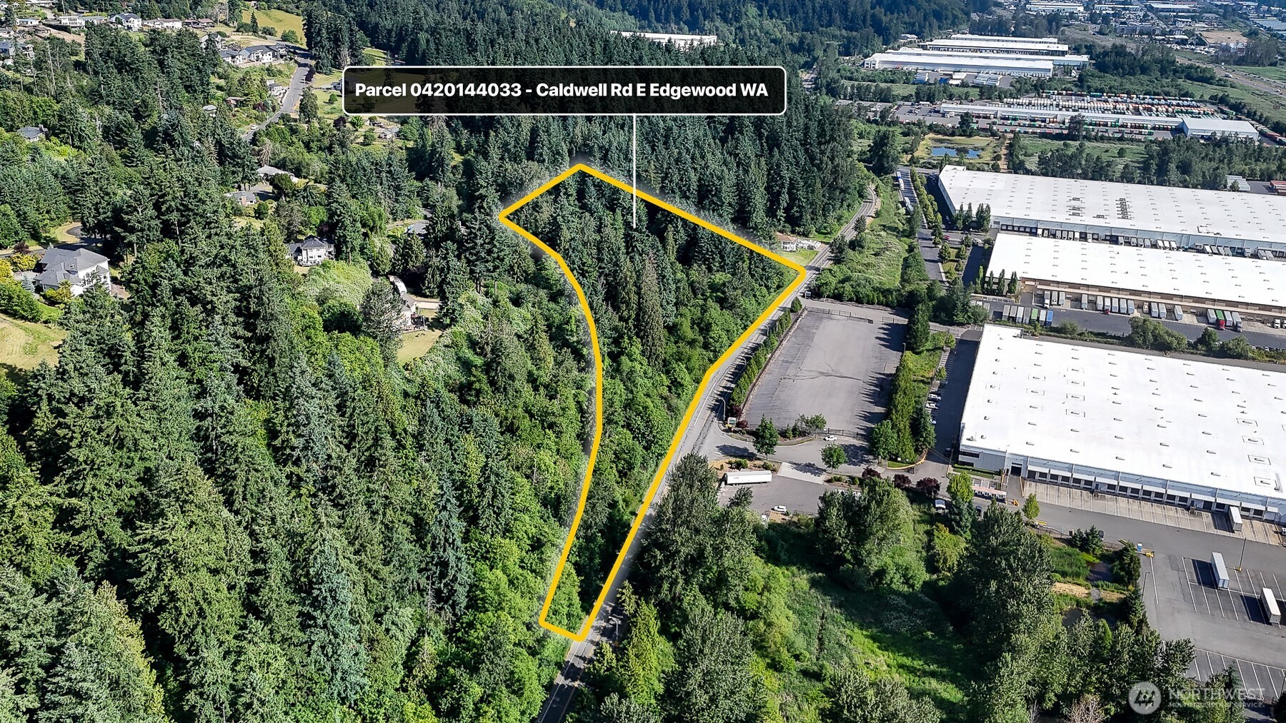0 Caldwell Road East Puyallup, WA 98372 - Photo 10 of 13 an aerial view of a house with a yard and potted plants