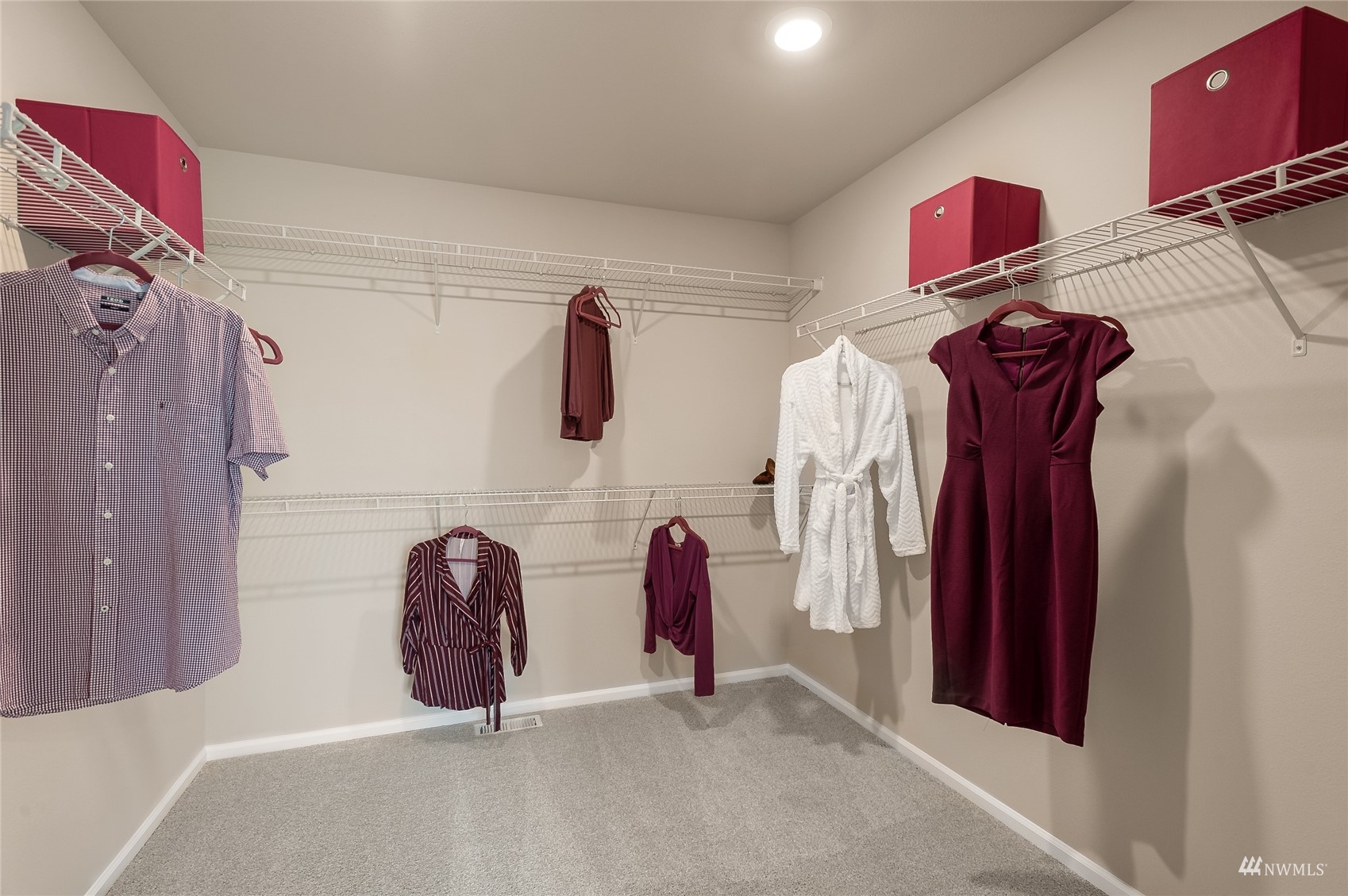 4018 233rd Street Southeast, Unit 76 Bothell, WA 98021 - Photo 18 of 18 a view of walk in closet with clothes and shoes