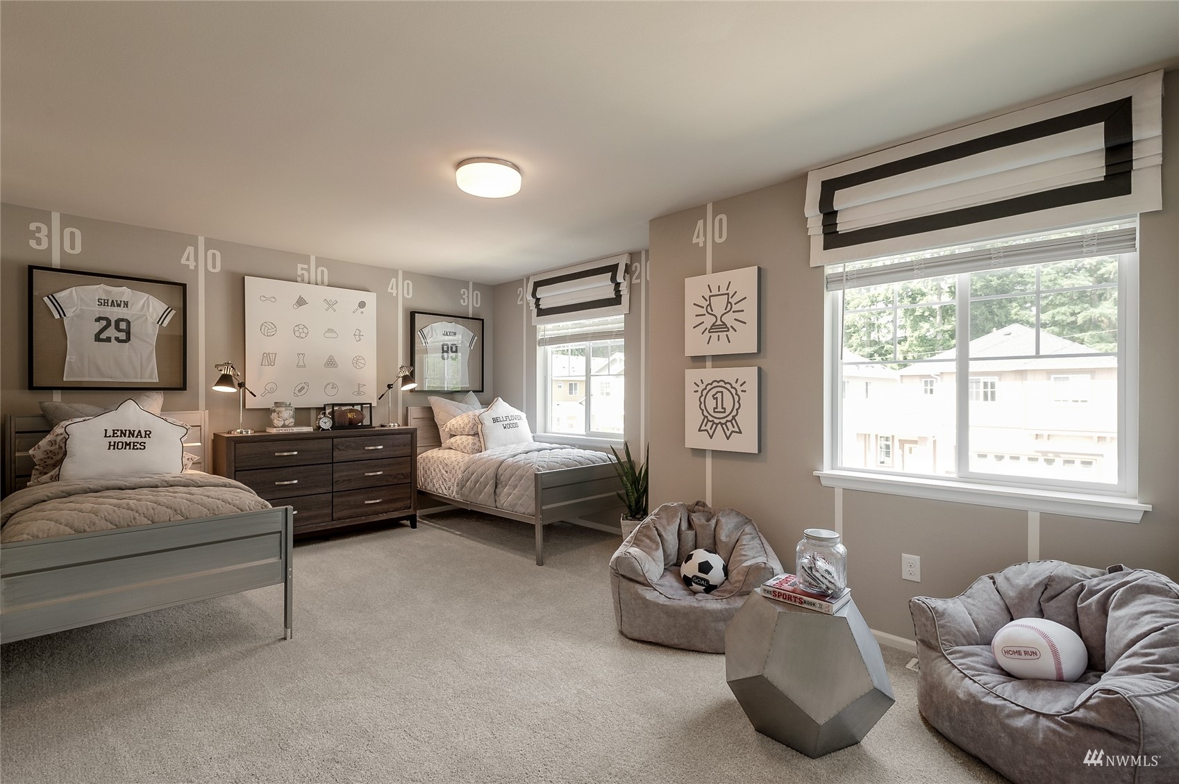 4018 233rd Street Southeast, Unit 76 Bothell, WA 98021 - Photo 6 of 18 a bedroom with furniture and a large window