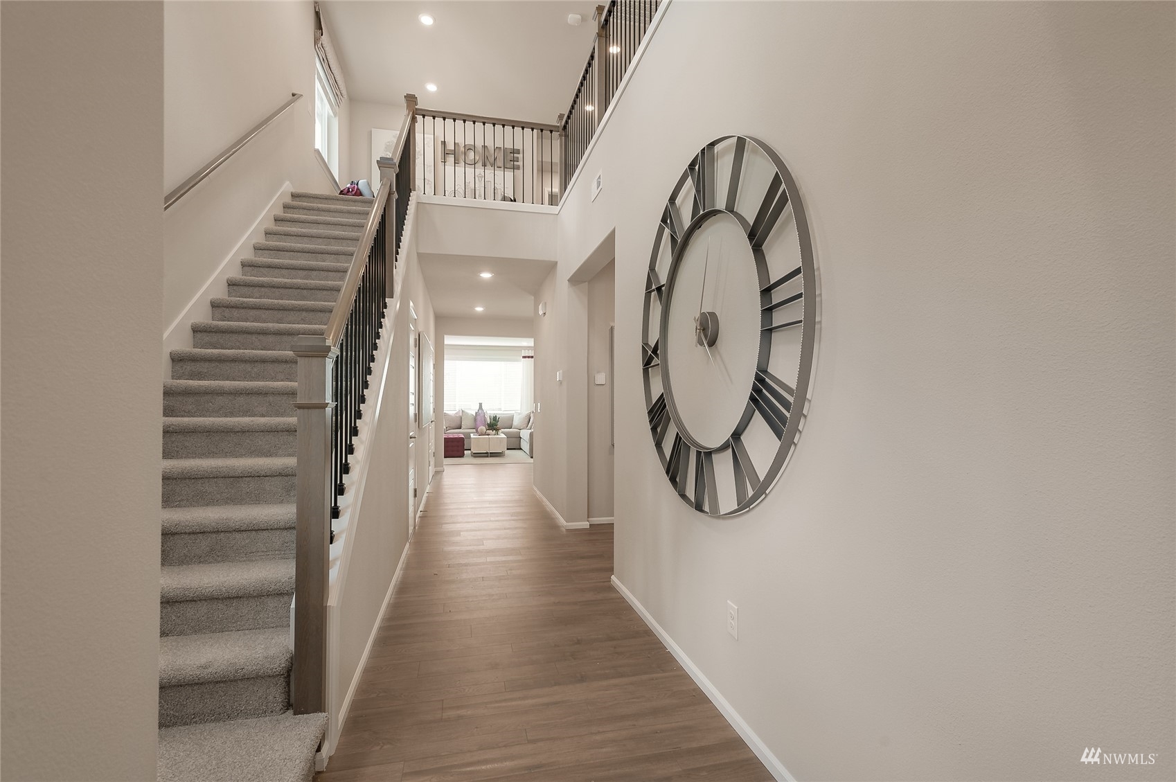 4018 233rd Street Southeast, Unit 76 Bothell, WA 98021 - Photo 10 of 18 a view of entryway and hall with wooden floor