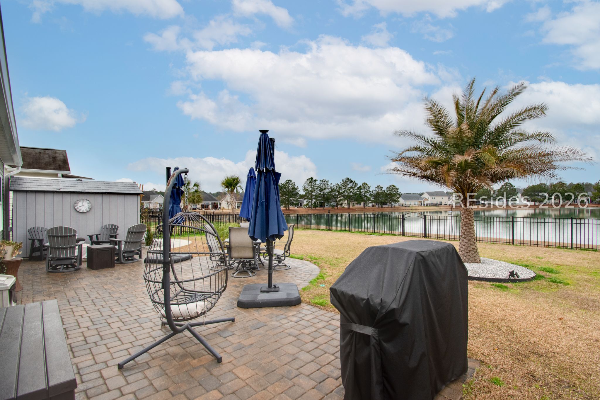 169 Fort Sullivan Drive Ridgeland, SC 29936 - Photo 36 of 57 Hardscaped patio & Shed conveys