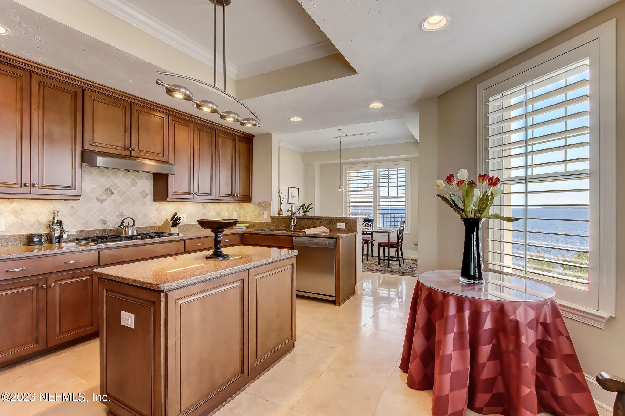 2358 Riverside Avenue, Unit 406 Jacksonville, FL 32204 - Photo 15 of 54 a kitchen with stainless steel appliances granite countertop a sink dishwasher stove and refrigerator