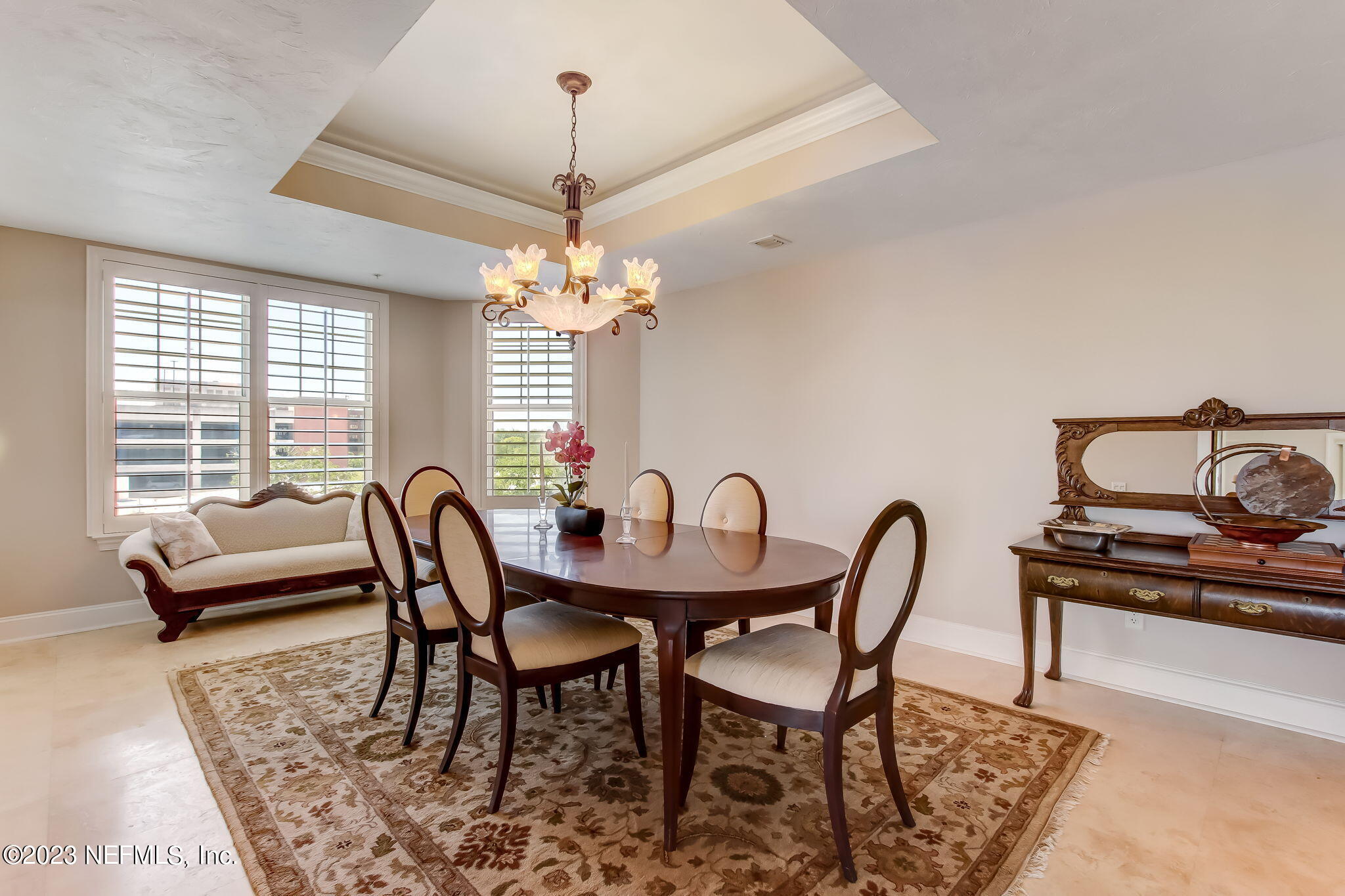 2358 Riverside Avenue, Unit 406 Jacksonville, FL 32204 - Photo 19 of 54 a view of a dining room with furniture window and outside view