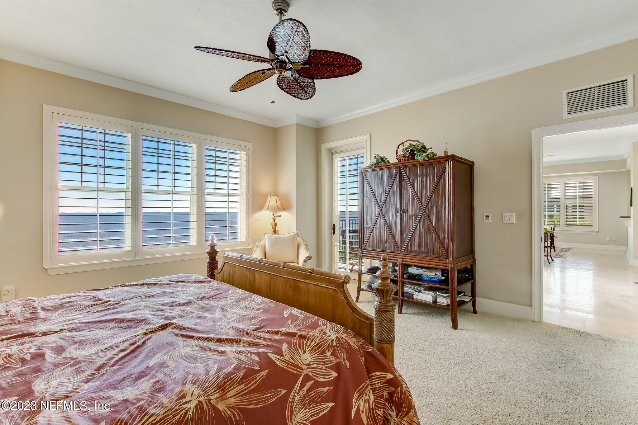 2358 Riverside Avenue, Unit 406 Jacksonville, FL 32204 - Photo 22 of 54 a bedroom with a bed furniture and a large window
