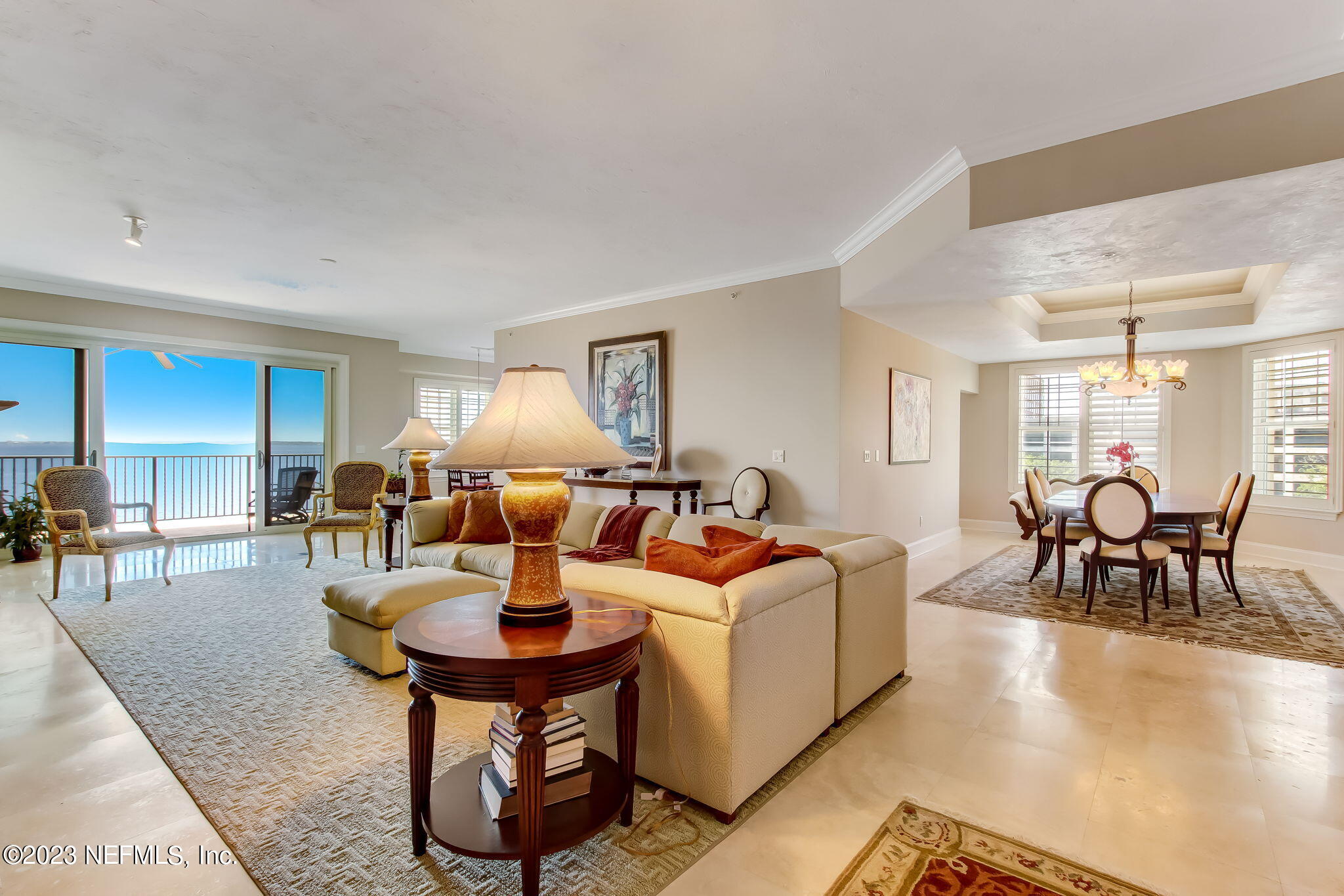 2358 Riverside Avenue, Unit 406 Jacksonville, FL 32204 - Photo 4 of 54 a living room with fireplace furniture and a table