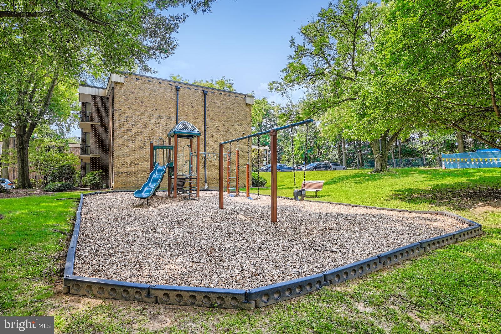 9900 Georgia Avenue, Unit 27716 Silver Spring, MD 20902 - Photo 34 of 37 a view of a park with a slide