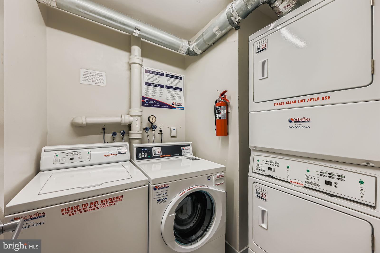 9900 Georgia Avenue, Unit 27716 Silver Spring, MD 20902 - Photo 36 of 37 a utility room with dryer and washer
